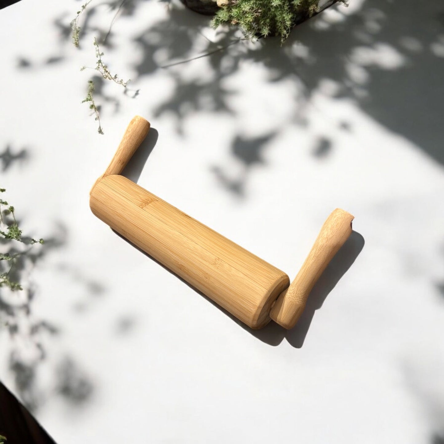 Rodillo de bambú con asas