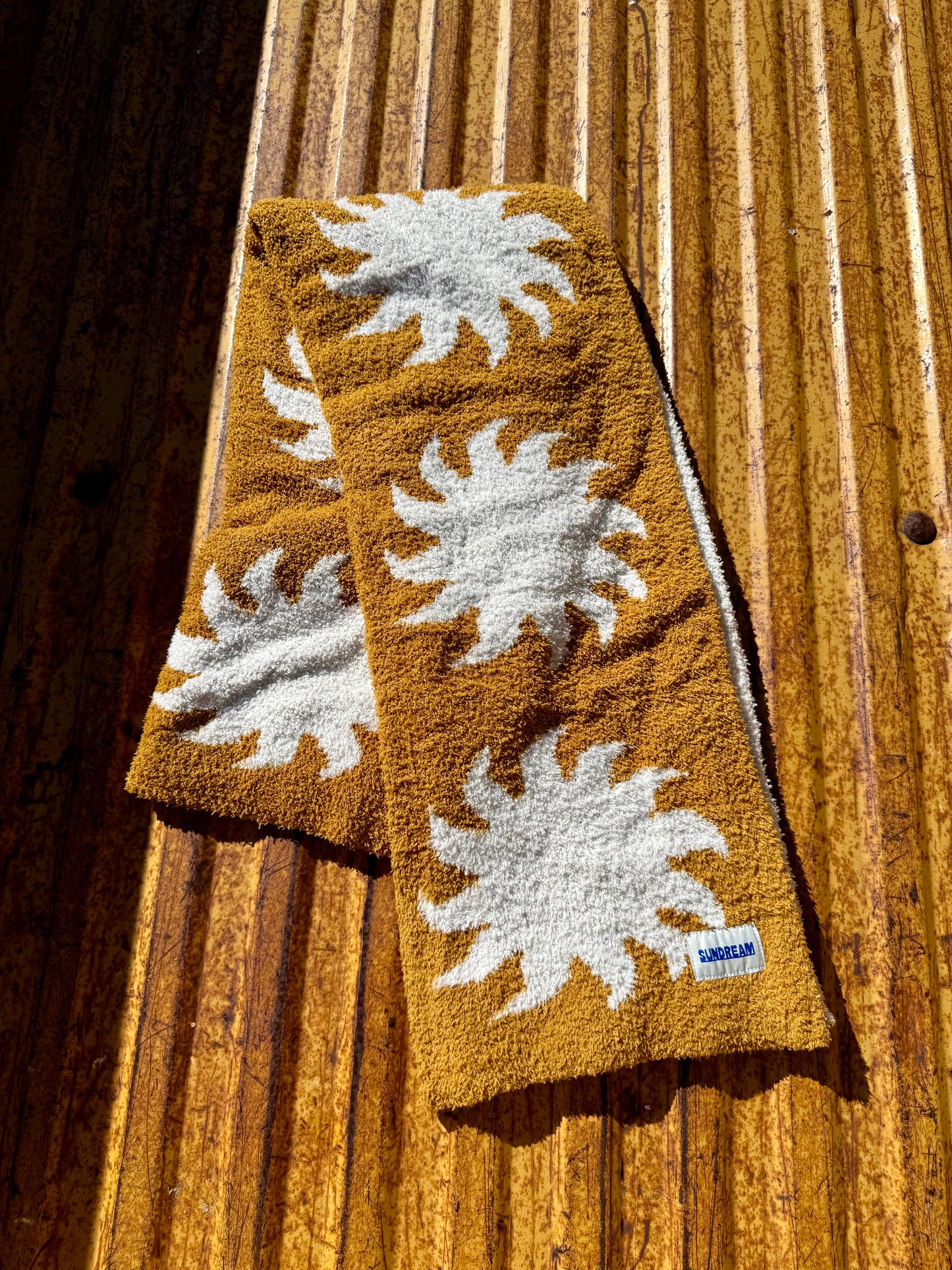 Manta de peluche con forma de sol - Marrón Buckhorn