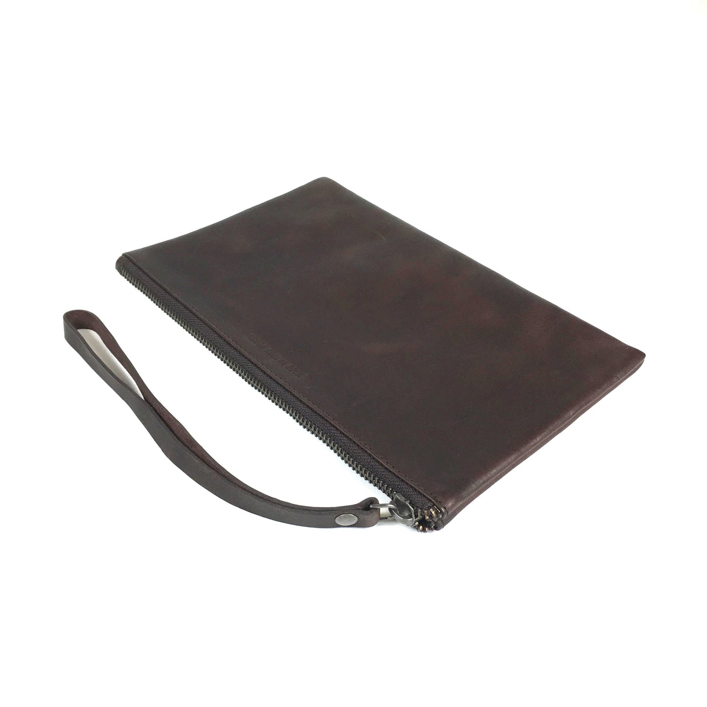 Cartera de mano de cuero, color marrón