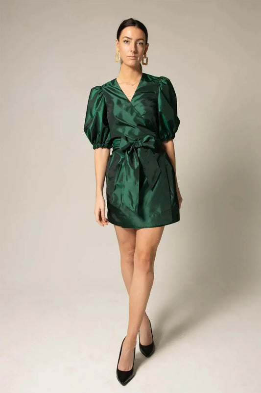Woman wearing a wrap dress styled for the office, eco-friendly fashion by WONENA