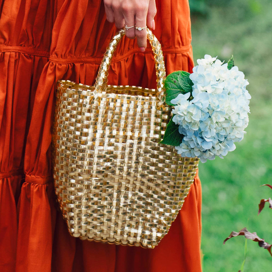 Durable eco-friendly tote and crossbody bags made from recycled and natural materials styled with neutral sustainable outfits.