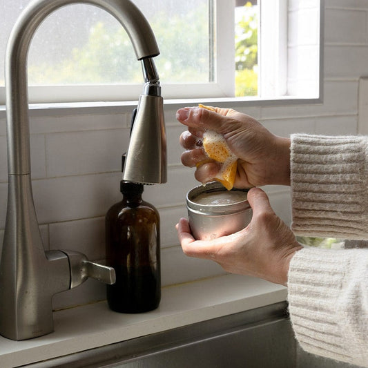 Conscious household essentials made from natural fibers arranged in a calm, neutral home interior.