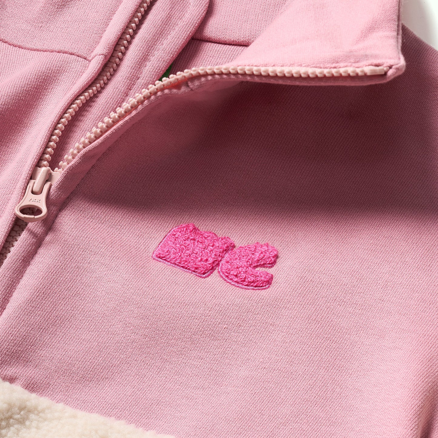 Sudadera rosa de sherpa con cremallera