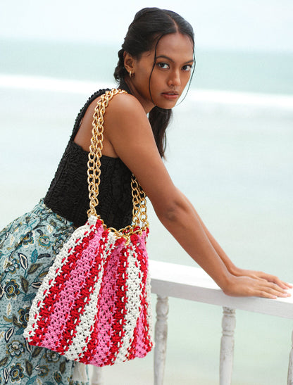 Bolso de playa de macramé COLETTE en rosa y rojo