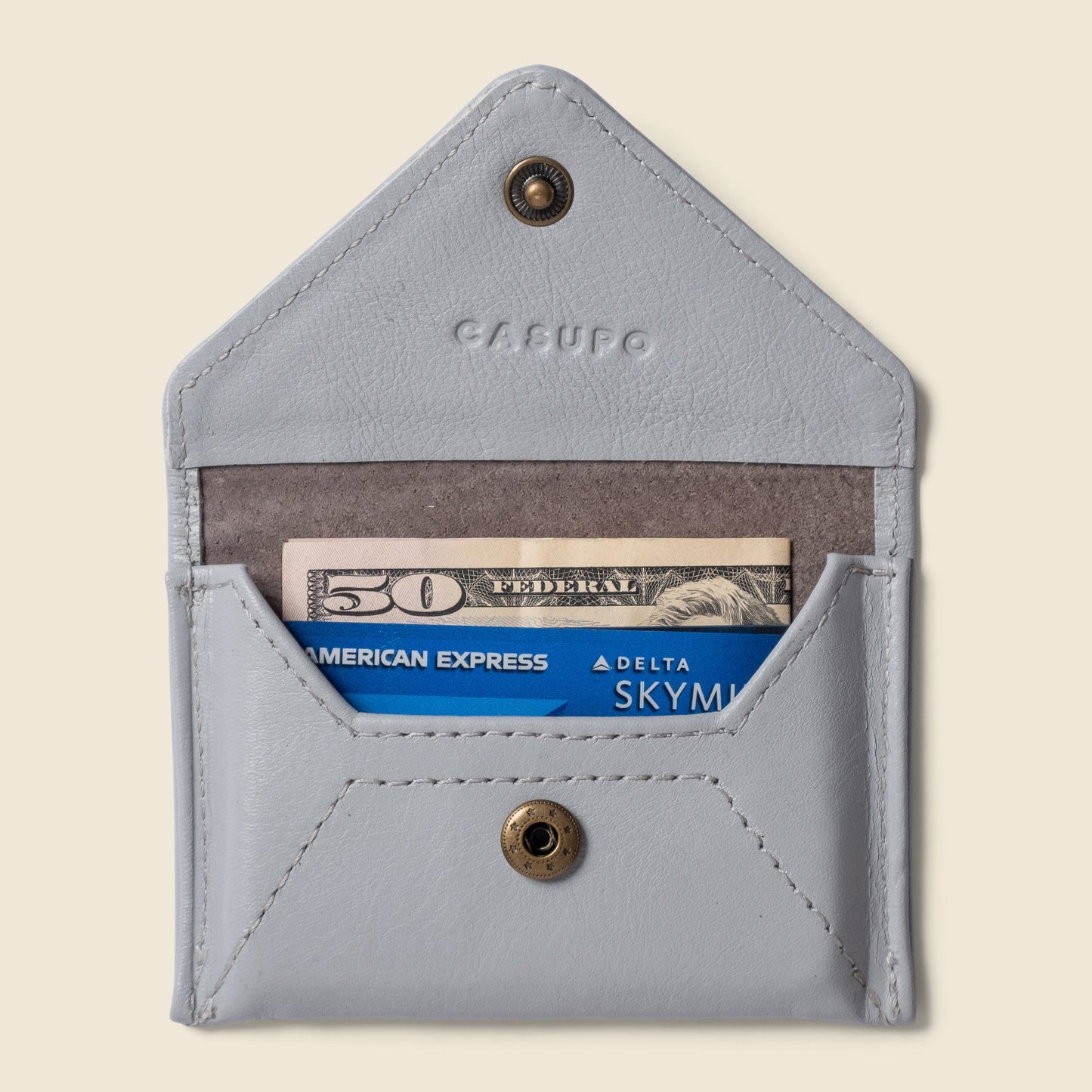 Mini cartera tipo sobre con protección RFID - Azul hielo