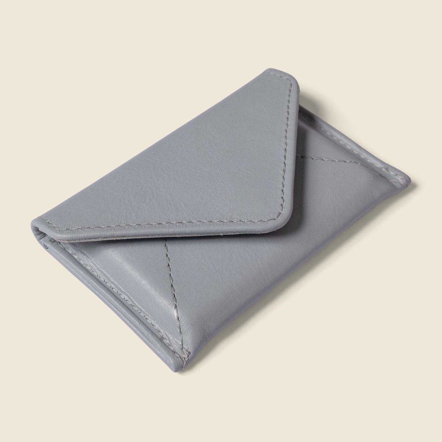 Mini cartera tipo sobre con protección RFID - Azul hielo