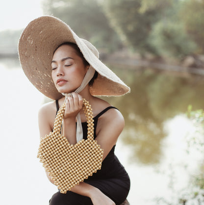 Bolso de mano con cuentas de madera Hati Heart