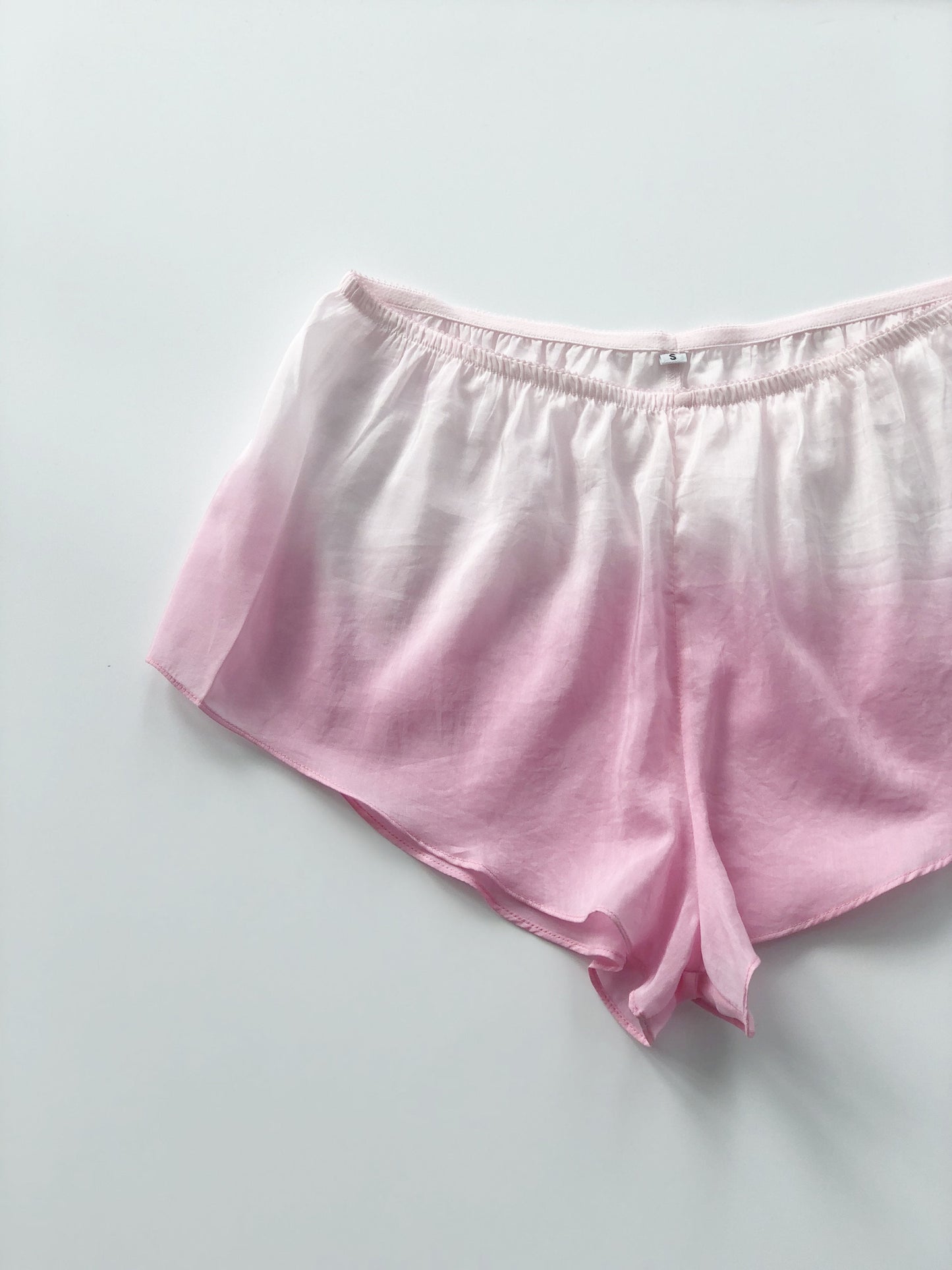 Shorts transparentes con degradado