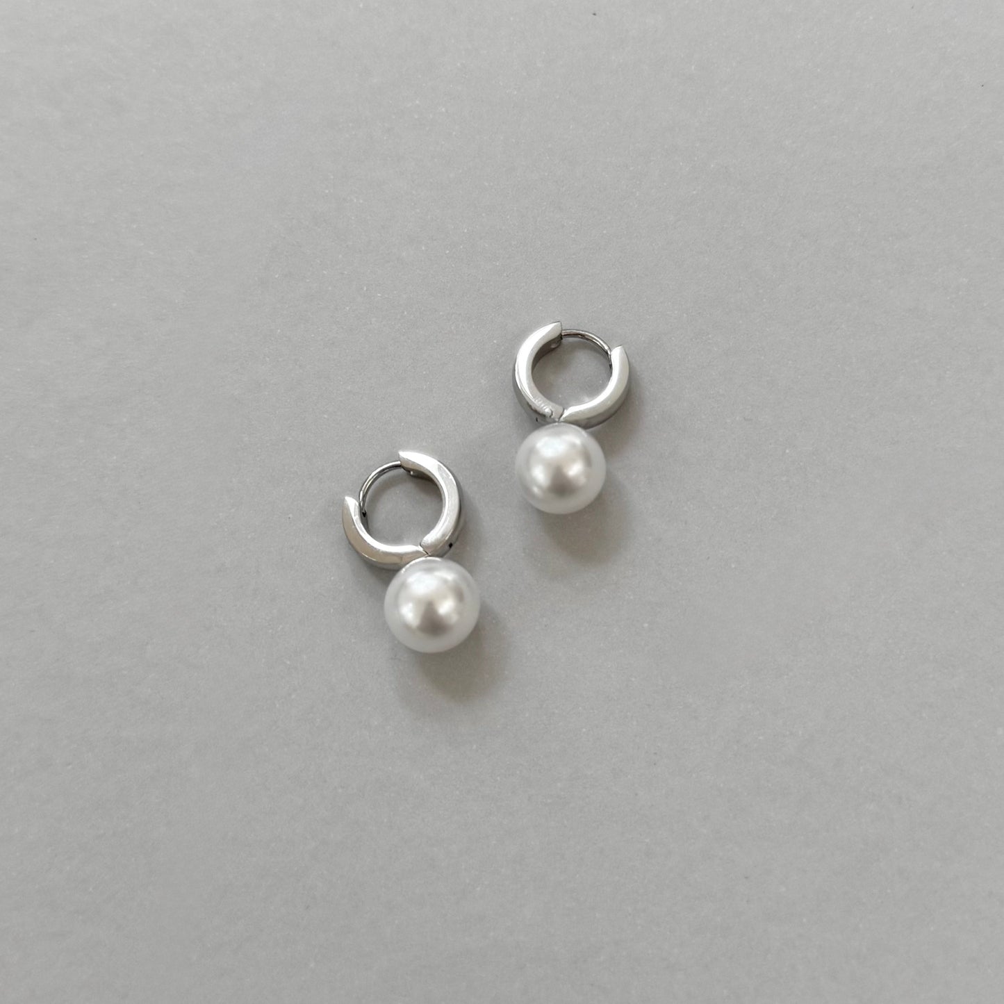 CASEY SILVER PEARL HUGGIE EARRINGS
