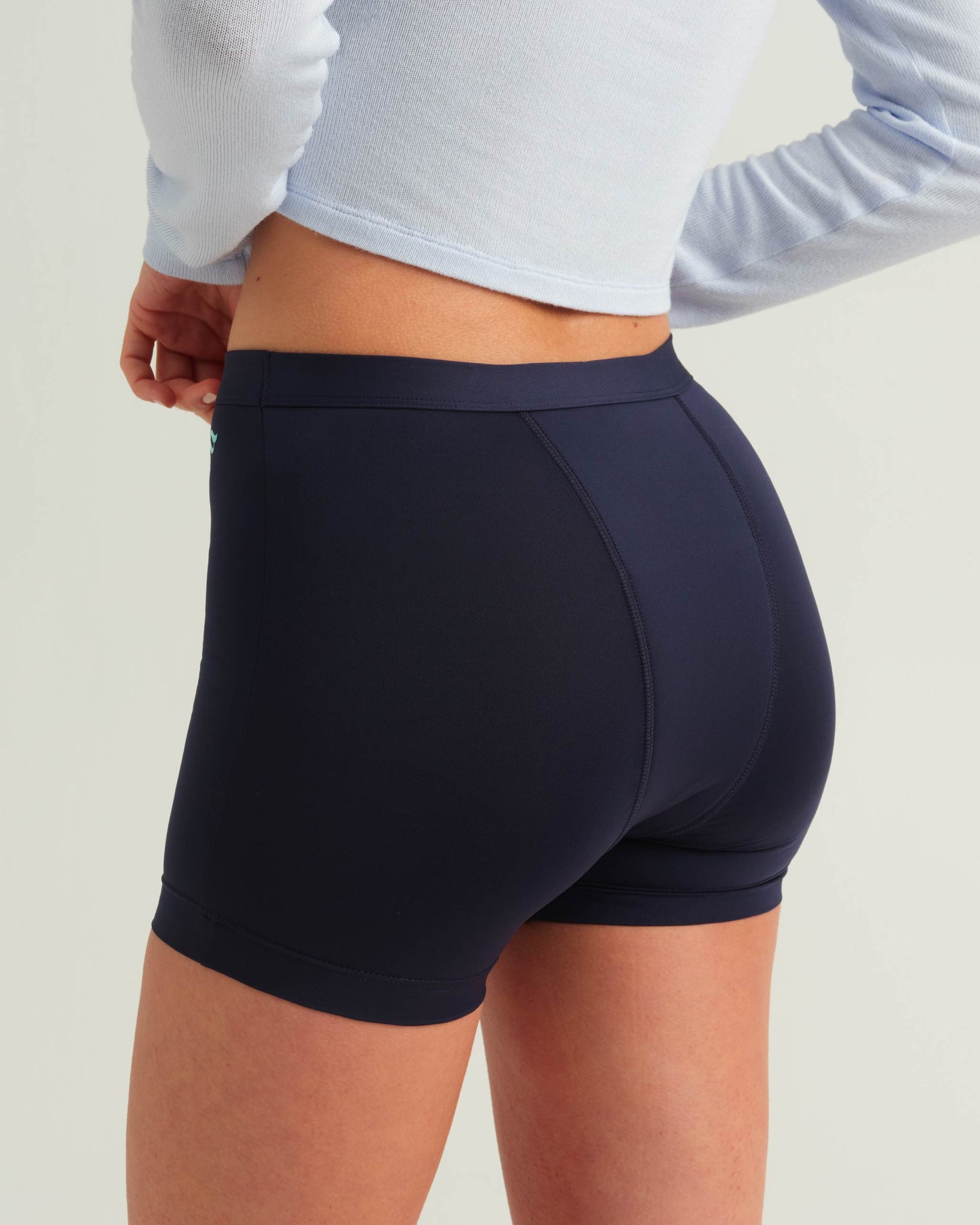 Pantalón corto deportivo para adolescentes a prueba de fugas
