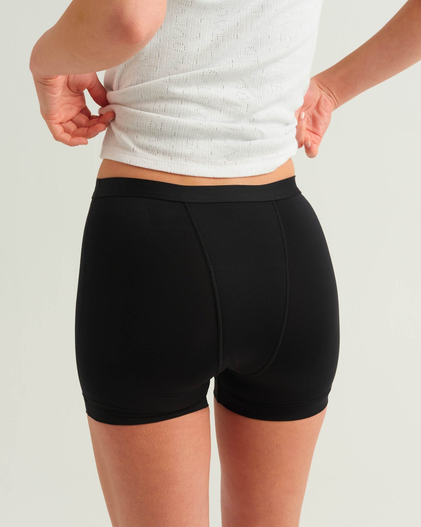 Pantalón corto deportivo para adolescentes a prueba de fugas