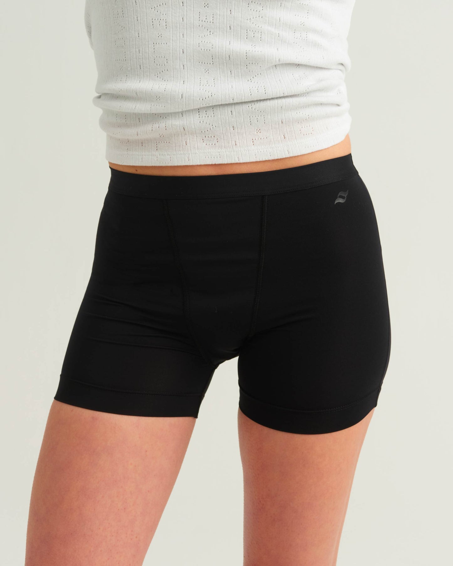 Pantalón corto deportivo para adolescentes a prueba de fugas