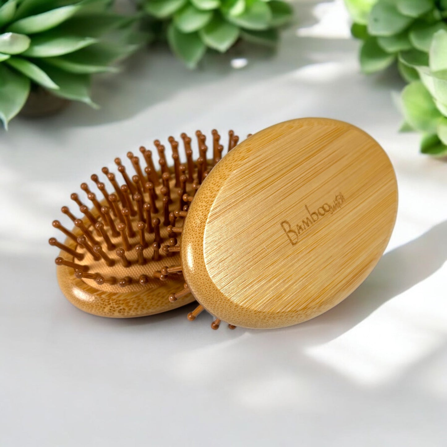 Cepillo de pelo de viaje de bambú