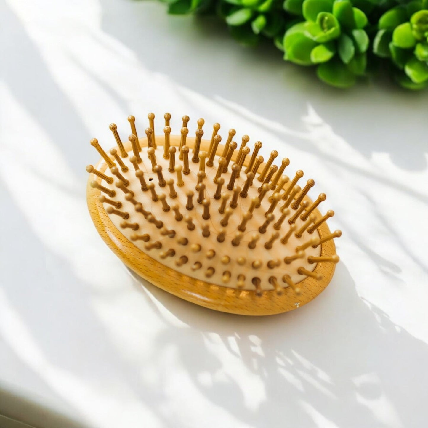 Cepillo de pelo de viaje de bambú