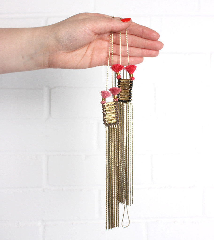 Collar de doble borla
