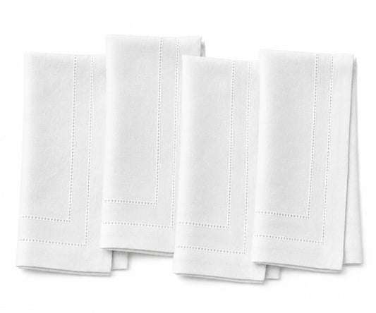 Servilletas blancas con dobladillo