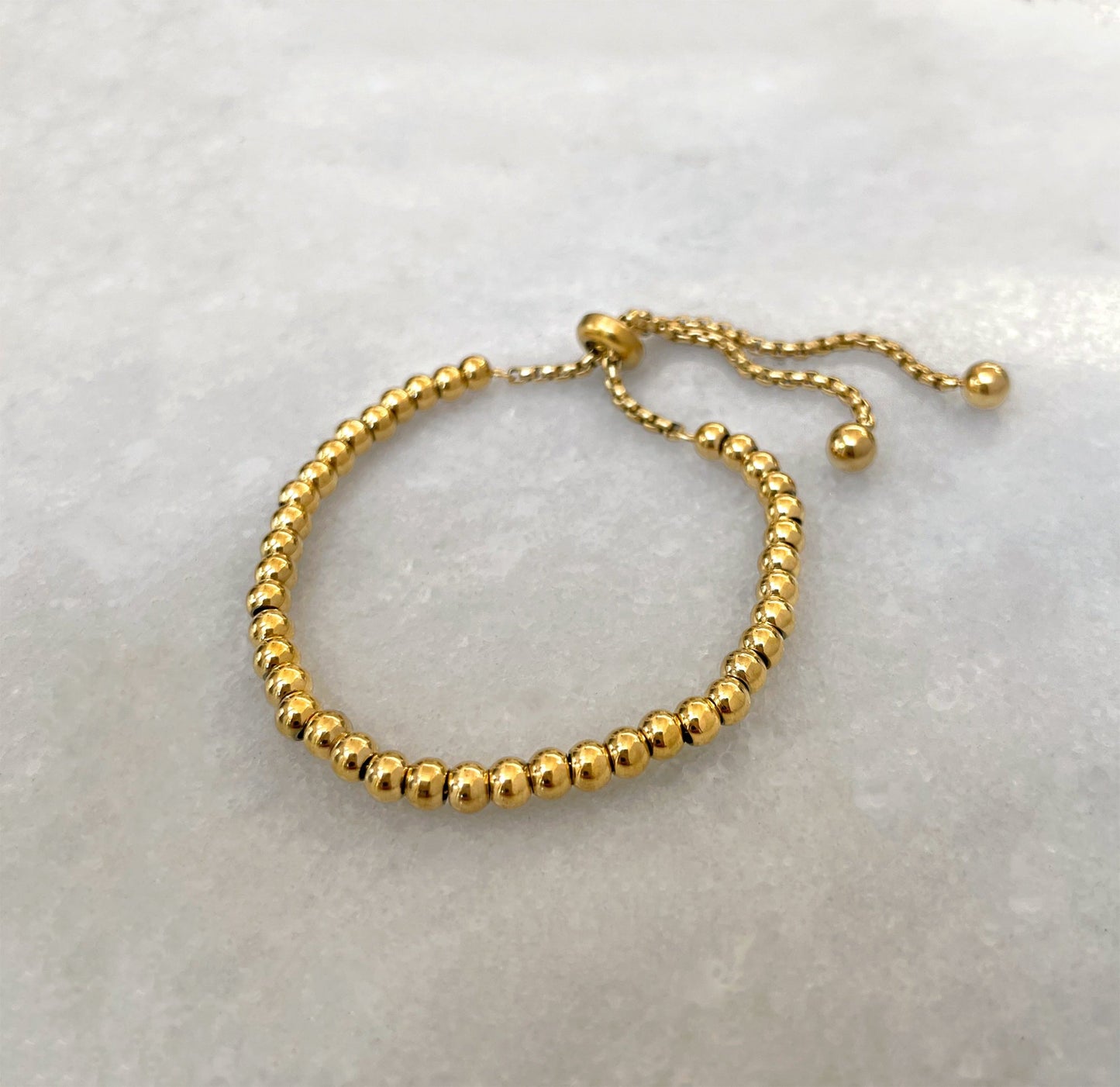 PULSERA DE CUENTAS CON BOLAS DE ORO ELLIE