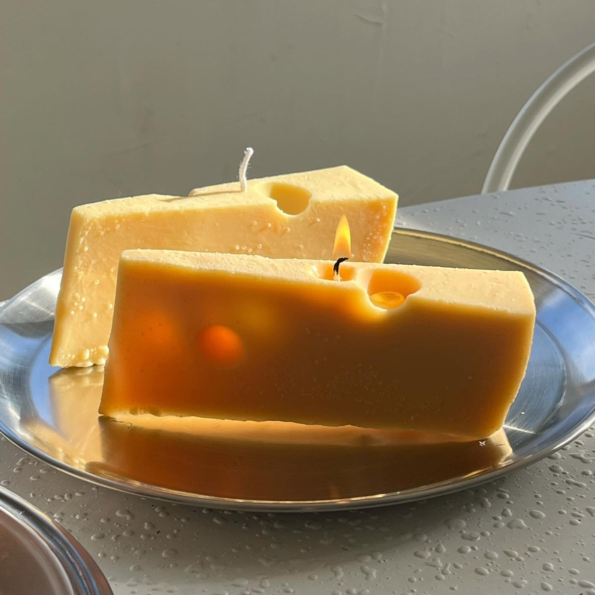 Vela de queso suizo